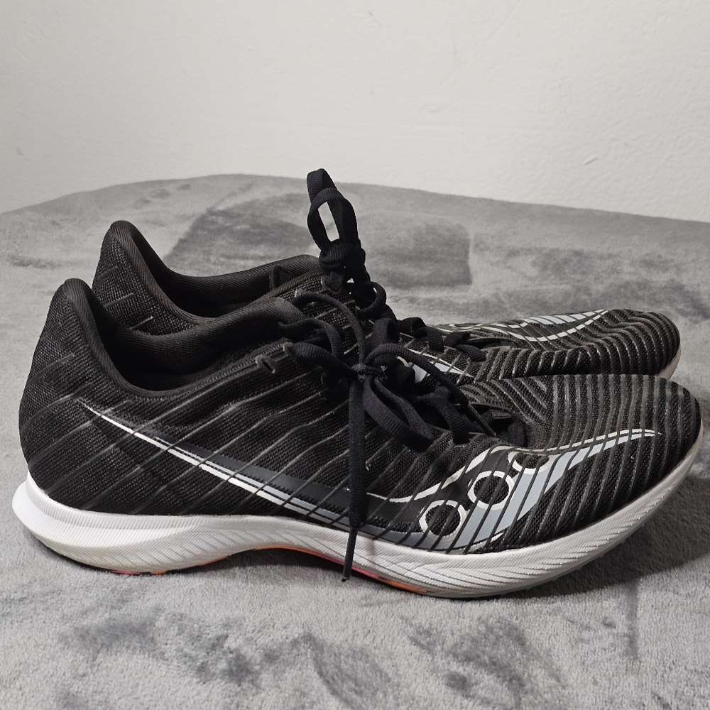 Saucony Black, White, and Pink Mens Running Shoes With Spikes Size 9.5